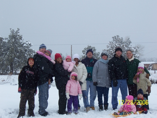 Photo from Scott Ranney:  Arnie and I are in the middle, surrounded by sons, daughters in law, 8 grandchildren ( still have 3 in Texas)..yes we live in Az and yes that is snow...