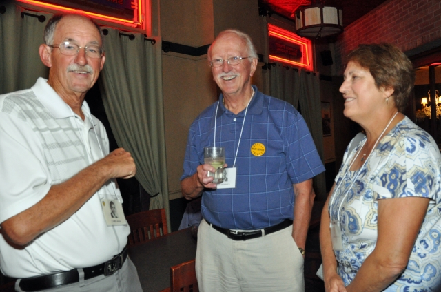Reunion Treasurer Jeff Broderick (center) and his wife Cindy. Carl Meier at the left. 